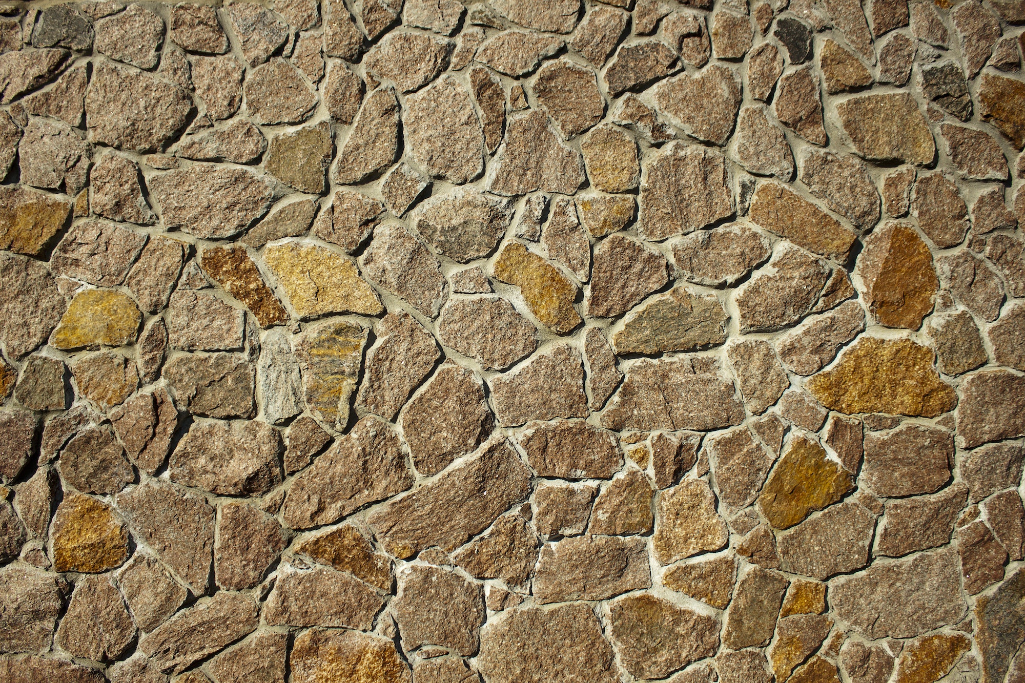 Architectural element masonry stone brick wall texture. close up background.